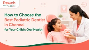 News Corner Child-friendly pediatric dentist explaining dental care to a smiling young girl in a dental clinic, featured image for choosing the best pediatric dentist in Chennai.